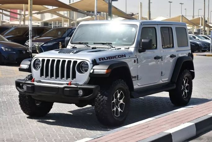 Подержанный Jeep Wrangler Rubicon IV (JL), 2.1 л, 2022 в Шардже от Alfaris Used Cars Серый цвет. Other | AUTO.AE
