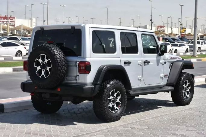 Подержанный Jeep Wrangler Rubicon IV (JL), 2.1 л, 2022 в Шардже от Alfaris Used Cars Серый цвет. Other | AUTO.AE