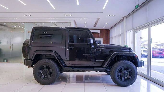 Подержанный Jeep Wrangler III (JK), 3.8 л, 2015 в Шардже от Alsalama Motors Черный цвет. GCC | AUTO.AE