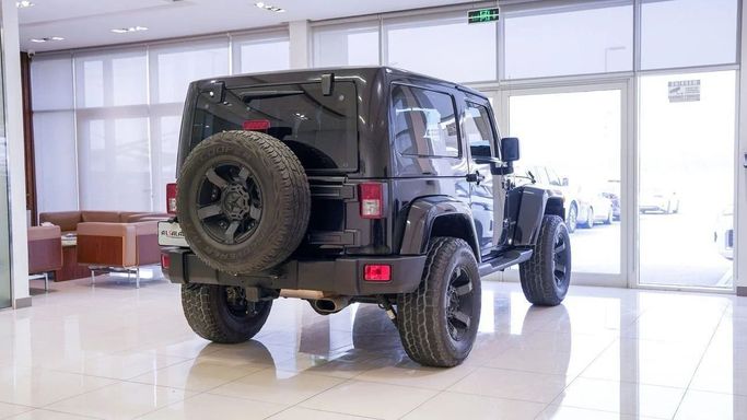 Подержанный Jeep Wrangler III (JK), 3.8 л, 2015 в Шардже от Alsalama Motors Черный цвет. GCC | AUTO.AE