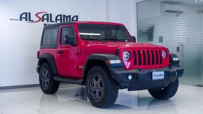 Подержанный Jeep Wrangler IV (JL), 3.6 л, 2019 в Шардже от Alsalama Motors Красный цвет. GCC | AUTO.AE