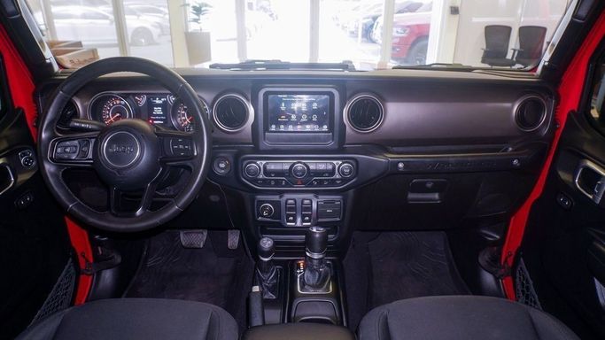 Подержанный Jeep Wrangler IV (JL), 3.6 л, 2019 в Шардже от Alsalama Motors Красный цвет. GCC | AUTO.AE