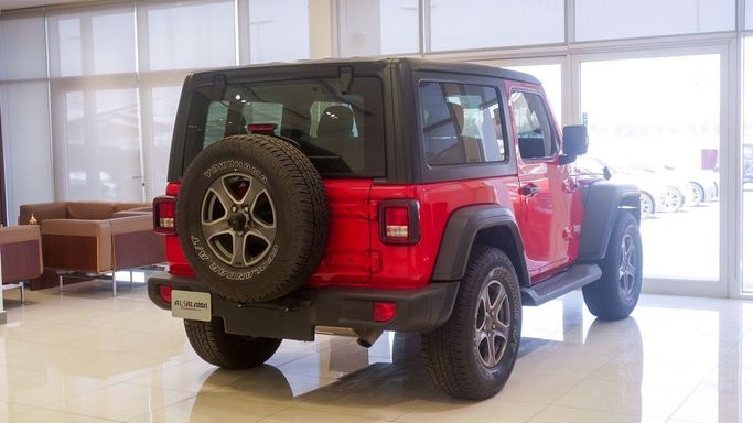 Подержанный Jeep Wrangler IV (JL), 3.6 л, 2019 в Шардже от Alsalama Motors Красный цвет. GCC | AUTO.AE