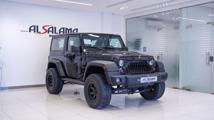 Подержанный Jeep Wrangler III (JK), 3.6 л, 2013 в Шардже от Alsalama Motors Черный цвет. GCC | AUTO.AE