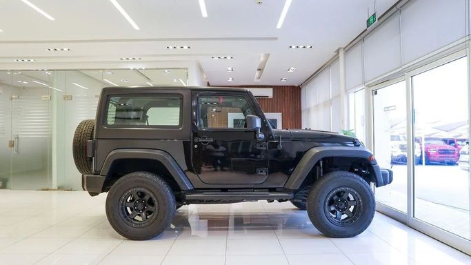 Подержанный Jeep Wrangler III (JK), 3.6 л, 2013 в Шардже от Alsalama Motors Черный цвет. GCC | AUTO.AE