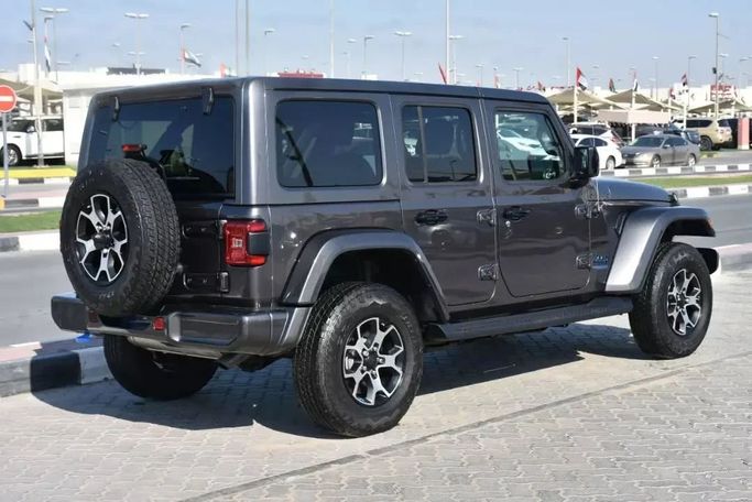 Used Jeep Wrangler IV (JL), 2.0 l, 2021 in Sharjah by Alfaris Used Cars, Grey color. Other | AUTO.AE