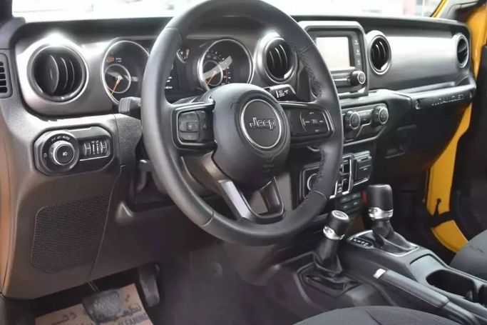 Used Jeep Wrangler IV (JL), 2.0 l, 2021 in Sharjah by Alfaris Used Cars, Yellow color. Other | AUTO.AE