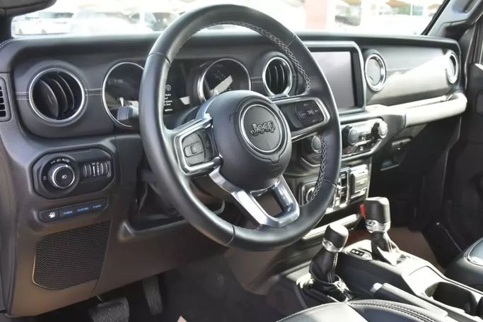 Used Jeep Wrangler IV (JL), 2.0 l, 2022 in Sharjah by Alfaris Used Cars, Grey color. Other | AUTO.AE