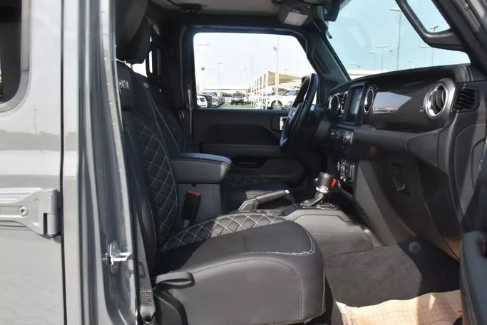 Used Jeep Wrangler IV (JL), 2.0 l, 2021 in Sharjah by Alfaris Used Cars, Grey color. Other | AUTO.AE