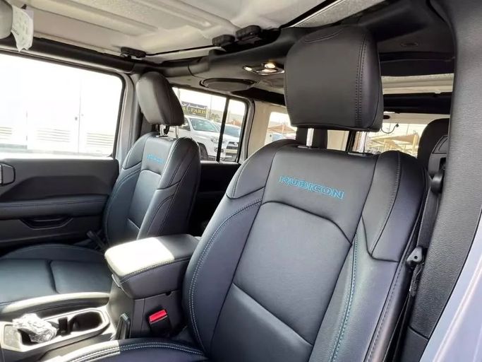 Used Jeep Wrangler IV (JL), 2.0 l, 2022 in Sharjah by Alfaris Used Cars, Grey color. Other | AUTO.AE