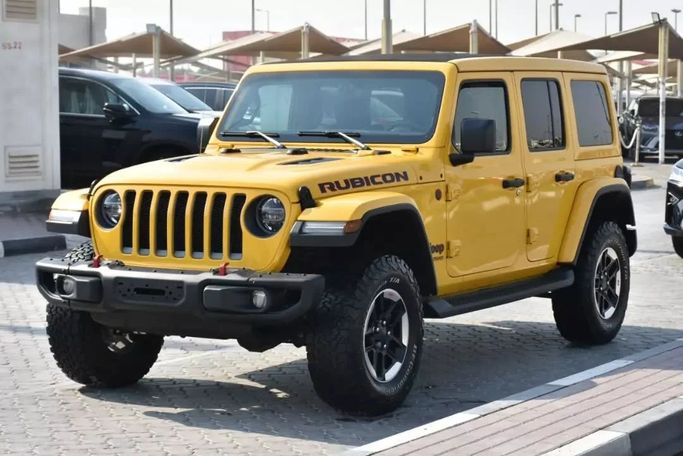 Used Jeep Wrangler IV (JL), 2.0 l, 2020 in Sharjah by Alfaris Used Cars, Yellow color. Other | AUTO.AE
