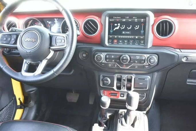 Used Jeep Wrangler IV (JL), 2.0 l, 2020 in Sharjah by Alfaris Used Cars, Yellow color. Other | AUTO.AE