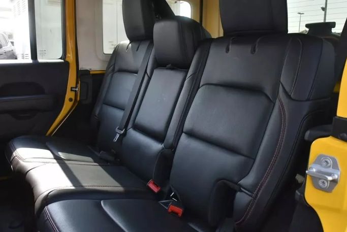 Used Jeep Wrangler IV (JL), 2.0 l, 2020 in Sharjah by Alfaris Used Cars, Yellow color. Other | AUTO.AE