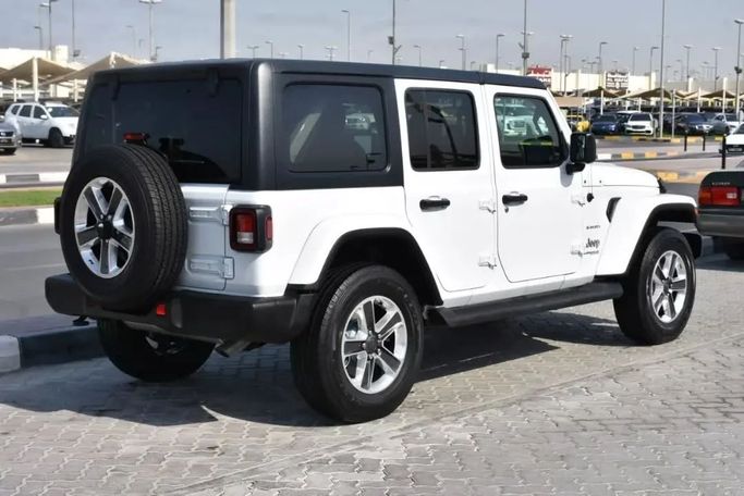 Used Jeep Wrangler IV (JL), 2.0 l, 2021 in Sharjah by Alfaris Used Cars, White color. Other | AUTO.AE