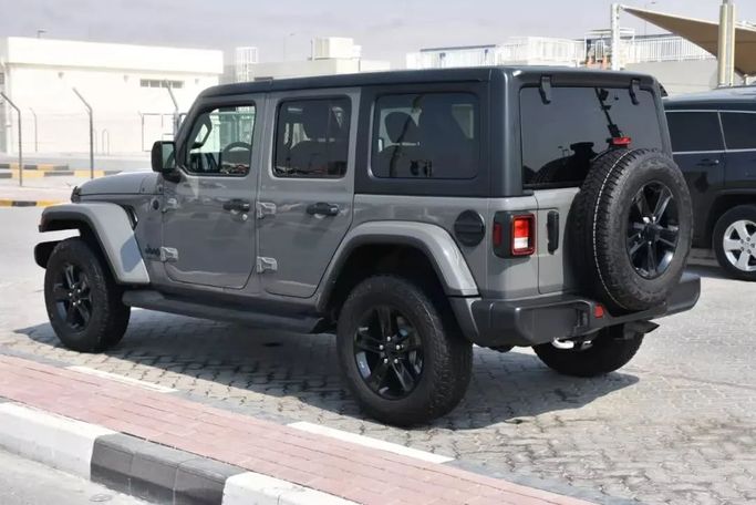 Подержанный Jeep Wrangler IV (JL), 2.0 л, 2021 в Шардже от Alfaris Used Cars Серый цвет. Other | AUTO.AE