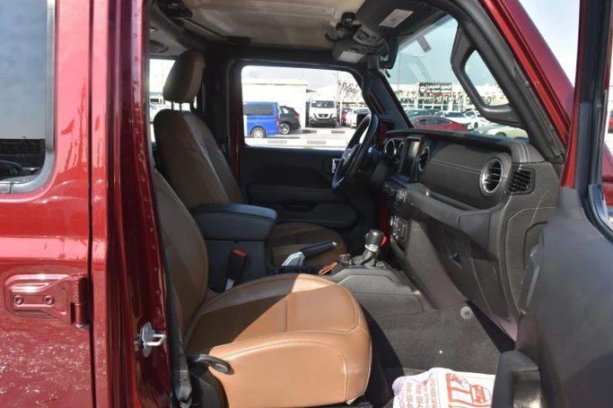 Used Jeep Wrangler IV (JL), 2.0 l, 2021 in Sharjah by Alfaris Used Cars, Red color. Other | AUTO.AE