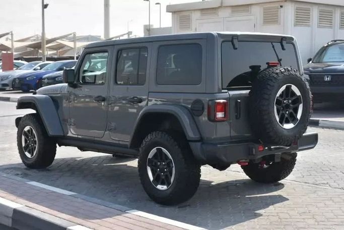 Used Jeep Wrangler IV (JL), 2.0 l, 2021 in Sharjah by Alfaris Used Cars, Grey color. Other | AUTO.AE