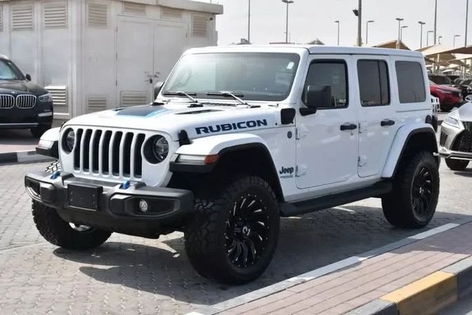 Used Jeep Wrangler IV (JL), 2.0 l, 2022 in Sharjah by Alfaris Used Cars, White color. Other | AUTO.AE