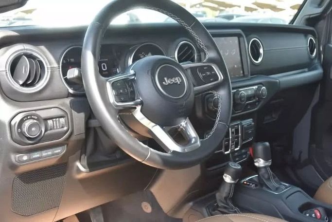 Used Jeep Wrangler IV (JL), 2.0 l, 2021 in Sharjah by Alfaris Used Cars, Grey color. Other | AUTO.AE