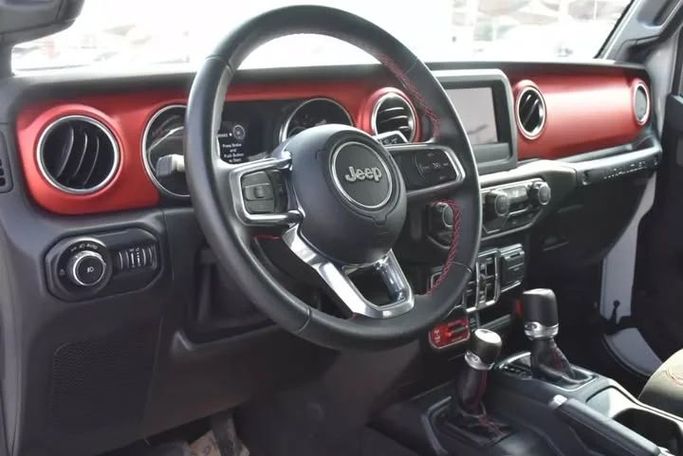 Used Jeep Wrangler IV (JL), 2.0 l, 2021 in Sharjah by Alfaris Used Cars, White color. Other | AUTO.AE