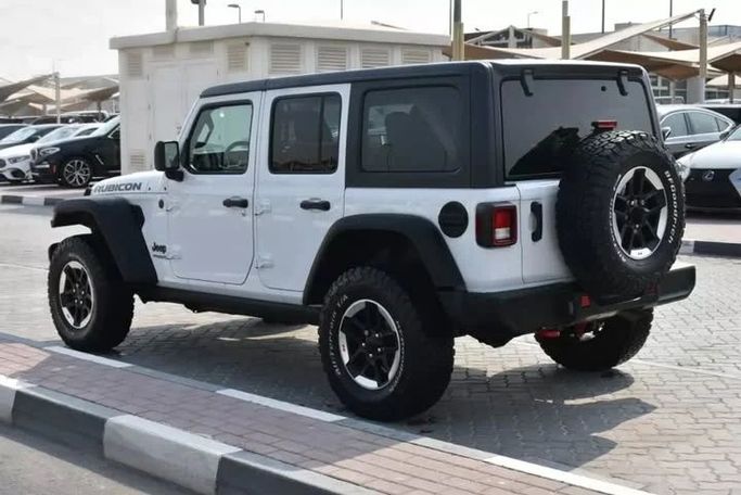 Used Jeep Wrangler IV (JL), 2.0 l, 2021 in Sharjah by Alfaris Used Cars, White color. Other | AUTO.AE