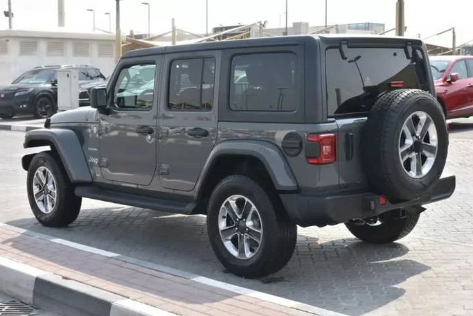 Used Jeep Wrangler IV (JL), 2.0 l, 2021 in Sharjah by Alfaris Used Cars, Grey color. Other | AUTO.AE