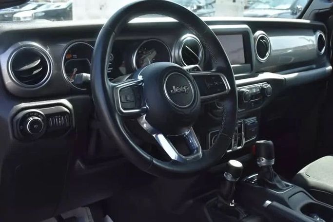 Used Jeep Wrangler IV (JL), 2.0 l, 2021 in Sharjah by Alfaris Used Cars, Green color. Other | AUTO.AE