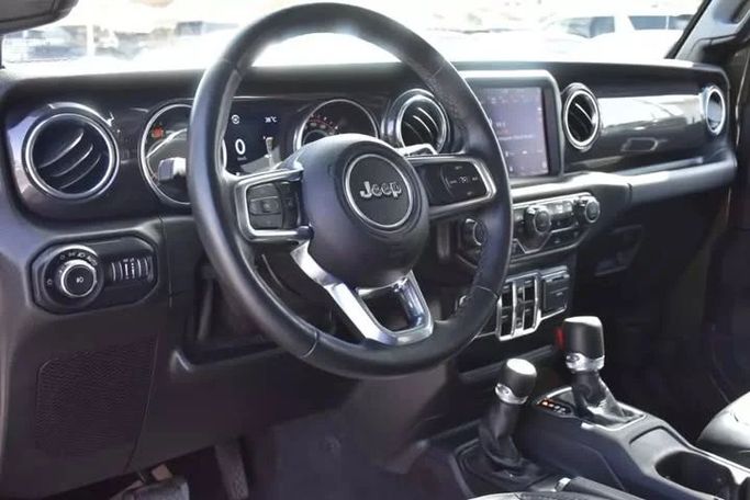 Used Jeep Wrangler IV (JL), 2.0 l, 2021 in Sharjah by Alfaris Used Cars, Green color. Other | AUTO.AE