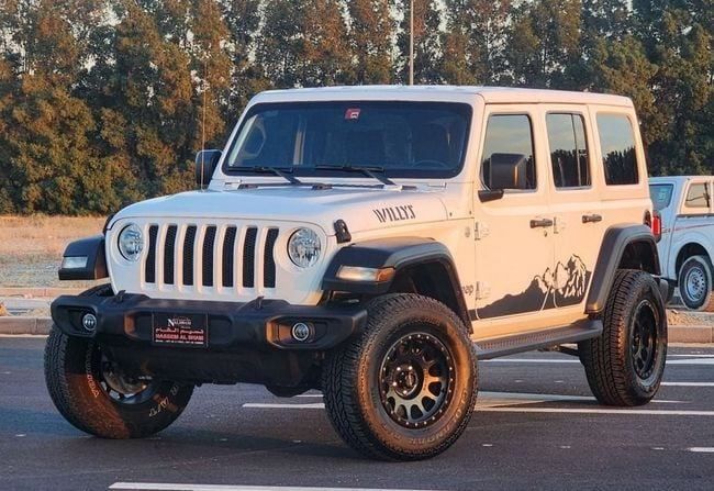 Used Jeep Wrangler IV (JL), 2.0 l, 2021 in Sharjah by Nassem Al Sham Used Cars, White color. American Specs | AUTO.AE