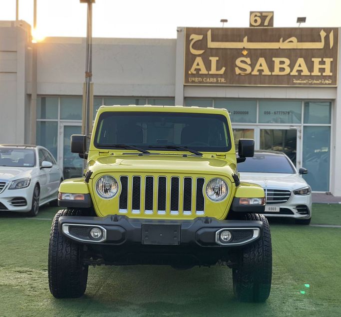 Used Jeep Wrangler IV (JL), 2.0 l, 2023 in Sharjah by Alsabah Used Cars, Yellow color. Canadian Specs | AUTO.AE