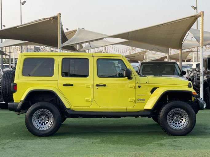Used Jeep Wrangler IV (JL), 2.0 l, 2023 in Sharjah by Alsabah Used Cars, Yellow color. Canadian Specs | AUTO.AE
