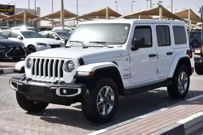 Подержанный Jeep Wrangler IV (JL), 2.0 л, 2021 в Шардже от Alfaris Used Cars Белый цвет. Other | AUTO.AE