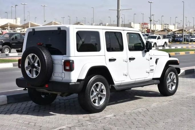 Подержанный Jeep Wrangler IV (JL), 2.0 л, 2021 в Шардже от Alfaris Used Cars Белый цвет. Other | AUTO.AE
