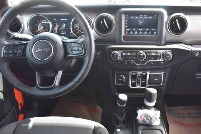 Подержанный Jeep Wrangler IV (JL), 3.6 л, 2019 в Шардже от Alfaris Used Cars Оранжевый цвет. Other | AUTO.AE
