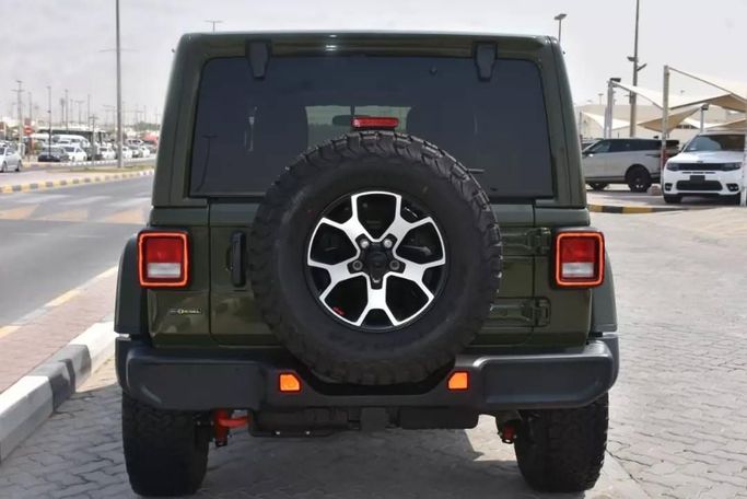 Подержанный Jeep Wrangler Rubicon IV (JL), 2.1 л, 2021 в Шардже от Alfaris Used Cars Зеленый цвет. Other | AUTO.AE