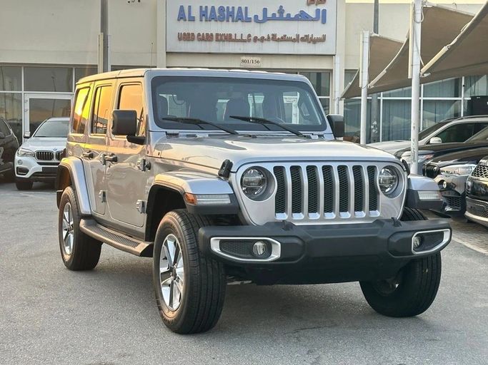 Подержанный Jeep Wrangler IV (JL), 3.6 л, 2020 в Шардже от Al Hashal Used Cars Серебристый цвет. GCC | AUTO.AE