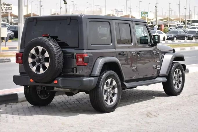 Used Jeep Wrangler IV (JL), 2.0 l, 2019 in Sharjah by Alfaris Used Cars, Grey color. Other | AUTO.AE