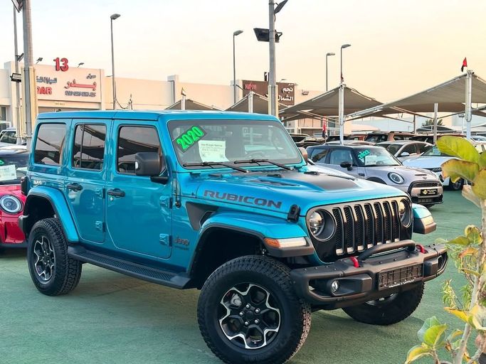 Used Jeep Wrangler IV (JL), 3.6 l, 2020 in Sharjah by Badar Used Cars, Light Blue color.  | AUTO.AE