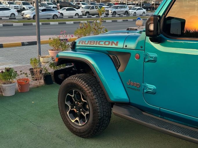 Used Jeep Wrangler IV (JL), 3.6 l, 2020 in Sharjah by Badar Used Cars, Light Blue color.  | AUTO.AE