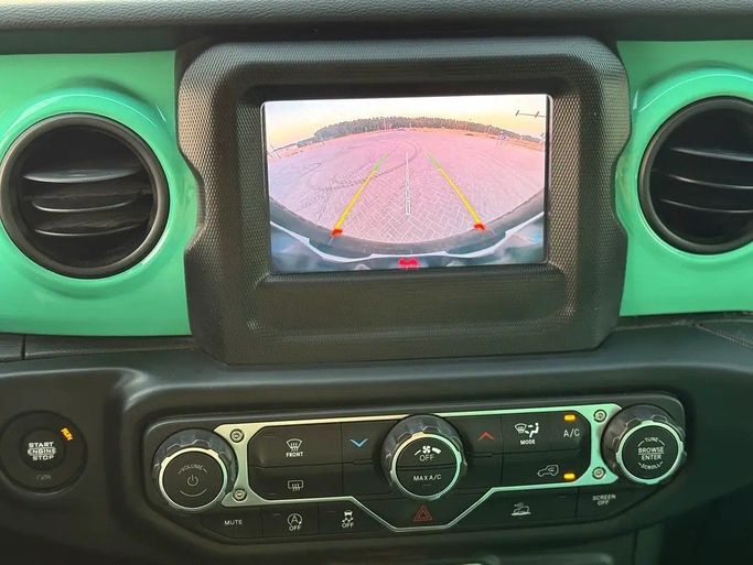 Used Jeep Wrangler IV (JL), 2.0 l, 2023 in Sharjah by Al Ahd Used Cars, Green color. American Specs | AUTO.AE