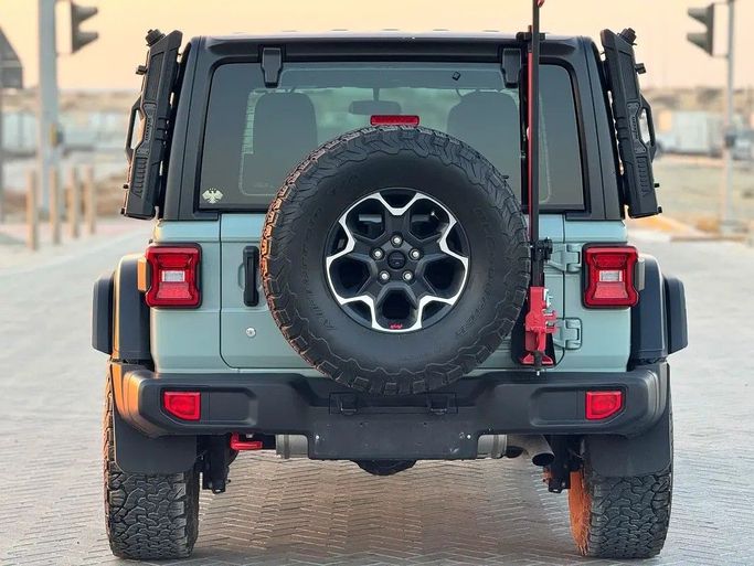 Used Jeep Wrangler IV (JL), 2.0 l, 2023 in Sharjah by Al Ahd Used Cars, Green color. American Specs | AUTO.AE