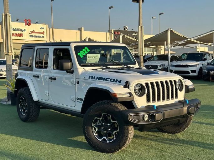 Подержанный Jeep Wrangler Rubicon IV (JL), 2.0 л, 2022 в Шардже от Badar Used Cars Белый цвет.  | AUTO.AE