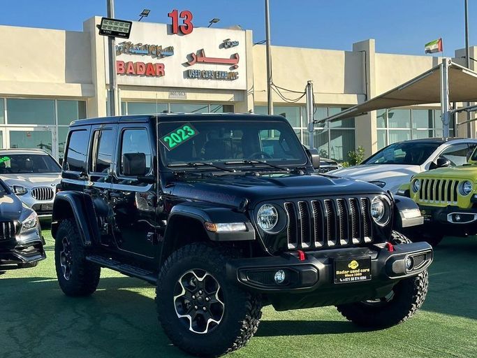 Used Jeep Wrangler IV (JL), 3.6 l, 2023 in Sharjah by Badar Used Cars, Black color.  | AUTO.AE