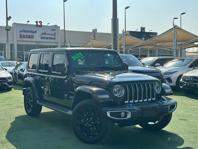 Used Jeep Wrangler IV (JL), 2.0 l, 2022 in Sharjah by Badar Used Cars, Black color.  | AUTO.AE