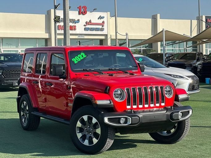Used Jeep Wrangler IV (JL), 2.0 l, 2022 in Sharjah by Badar Used Cars, Red color.  | AUTO.AE