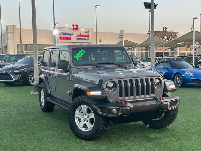 Used Jeep Wrangler IV (JL), 3.6 l, 2021 in Sharjah by Badar Used Cars, Grey color.  | AUTO.AE