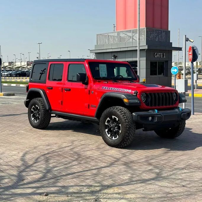 Used Jeep Wrangler 4xe IV (JL) Facelift, 2.0 l, 2024 in Sharjah by Golden Desert Used Car, Red color. Other | AUTO.AE