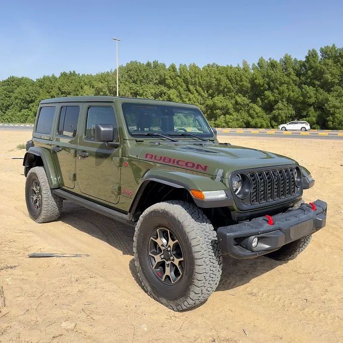 Used Jeep Wrangler IV (JL) Facelift, 3.6 l, 2024 in Sharjah by Golden Desert Used Car, Green color. Other | AUTO.AE