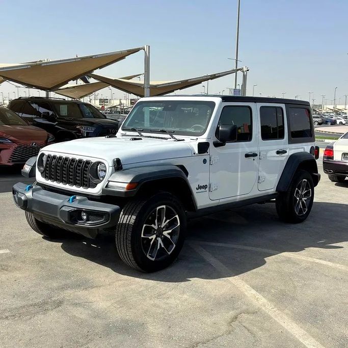 Used Jeep Wrangler 4xe IV (JL) Facelift, 2.0 l, 2024 in Sharjah by Golden Desert Used Car, White color. Other | AUTO.AE