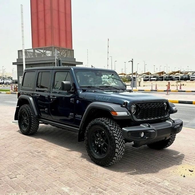 Used Jeep Wrangler 4xe IV (JL) Facelift, 2.0 l, 2025 in Sharjah by Golden Desert Used Car, Navy Blue color. Other | AUTO.AE